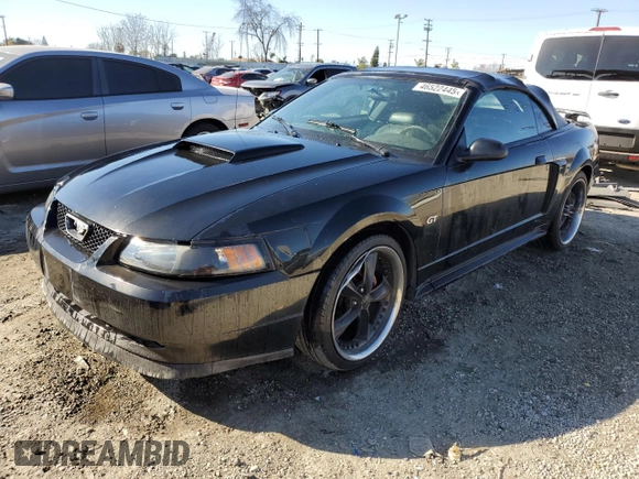 2001 Ford Mustang GT Deluxe with VIN 1FAFP45X51F165193, listed as a Copart auction lot 46522445 with 196,906 mi miles and Salvage Title. Bid and sale history available at carsss.com. Image 1.