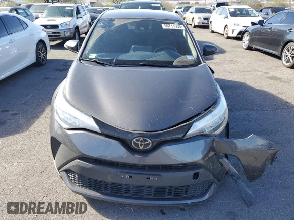 2021 Toyota C-HR LE z VIN NMTKHMBX8MR130564, wystawiony jako Copart lot #56711535 z przebiegiem 94 007 mil mil oraz Szkoda całkowita • Salvage title. Historia ofert i sprzedaży dostępna na DreamBid. Obrazek 5.