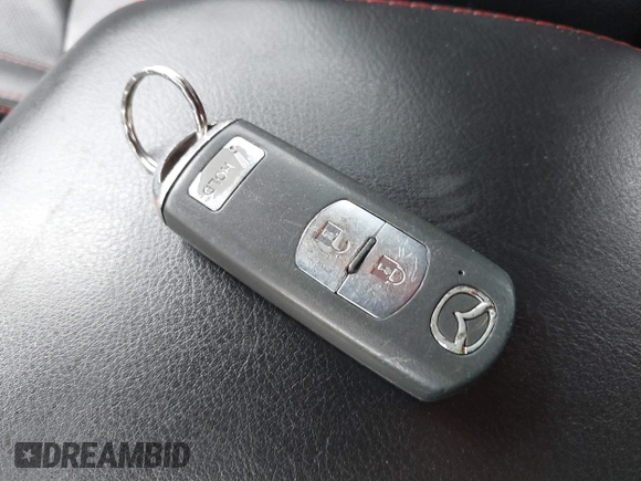 2014 Mazda 3 S Grand Touring with VIN JM1BM1M3XE1164610, listed as a IAAI auction lot 42421946 with 96,591 mi miles and . Bid and sale history available at DreamBid. Image 11.