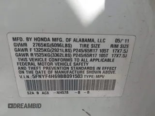 2011 Honda Pilot EX-L with VIN 5FNYF4H69BB091503, listed as a IAAI auction lot 42103011 with 246,816 mi miles and . Bid and sale history available at carsss.com. Image 9.