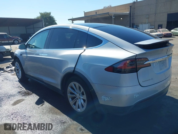 2016 Tesla Model X 70D with VIN 5YJXCAE21GF033123, listed as a IAAI auction lot 39813497 with 162,509 mi miles and . Bid and sale history available at DreamBid. Image 3.