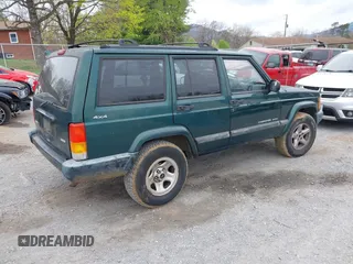 2001 Jeep Cherokee Sport with VIN 1J4FF48S51L561438, listed as a IAAI auction lot 41965207 with 222,868 mi miles and . Bid and sale history available at DreamBid. Image 4.