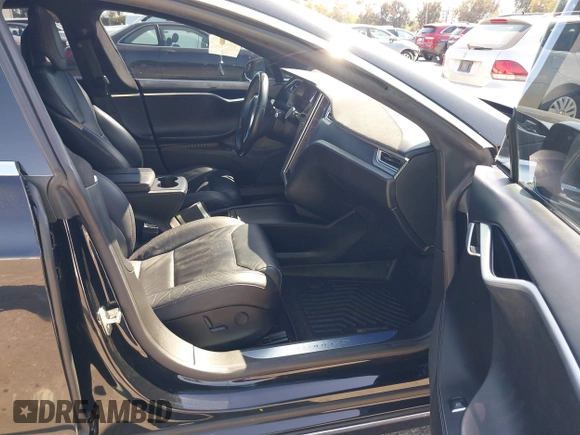 2017 Tesla Model S 100D with VIN 5YJSA1E21HF202591, listed as a IAAI auction lot 41983073 with 140,282 mi miles and . Bid and sale history available at DreamBid. Image 5.