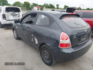 2007 Hyundai Accent GS with VIN KMHCM36C07U003757, listed as a IAAI auction lot 41925544 with 89,882 mi miles. Bid and sale history available at carsss.com. Image 3.