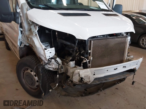 2021 Ford Transit Cargo с VIN 1FTBW3X87MKA60727, выставлен на аукционе IAAI как лот 41701879 с пробегом 76 052 миль миль и . История ставок и продаж доступна на DreamBid. Изображение 18.