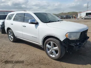 2013 Dodge Durango Citadel with VIN 1C4RDJEG0DC665962, listed as a IAAI auction lot 41900527 with 173,550 mi miles and . Bid and sale history available at carsss.com. Image 1.