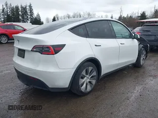2021 Tesla Model Y Standard Range with VIN 5YJYGDED3MF103499, listed as a IAAI auction lot 41632064 with 132,846 mi miles and . Bid and sale history available at DreamBid. Image 4.