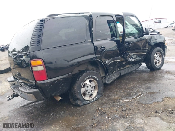 2003 Chevrolet Tahoe LS with VIN 1GNEC13Z73R243308, listed as a IAAI auction lot 41510266 with 246,378 mi miles. Bid and sale history available at carsss.com. Image 4.