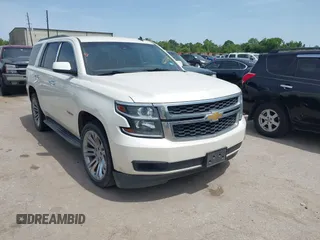 2015 Chevrolet Tahoe LT with VIN 1GNSCBKC1FR180992, listed as a IAAI auction lot 42273358 with 223,777 mi miles and . Bid and sale history available at DreamBid. Image 1.