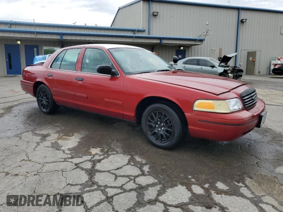 1999 Ford Crown Victoria Police with VIN 2FAFP71W7XX167653, listed as a Copart auction lot 54241955 with 81,967 mi miles and Salvage Title. Bid and sale history available at carsss.com. Image 4.