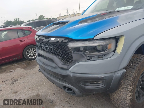 2021 Ram 1500 TRX with VIN 1C6SRFU91MN790158, listed as a IAAI auction lot 42115253 with 30,969 mi miles and . Bid and sale history available at DreamBid. Image 17.