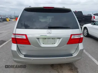 2007 Honda Odyssey Touring z VIN 5FNRL38877B091046, wystawiony jako IAAI lot #42187965 z przebiegiem Nie podano mil oraz . Historia ofert i sprzedaży dostępna na DreamBid. Obrazek 16.