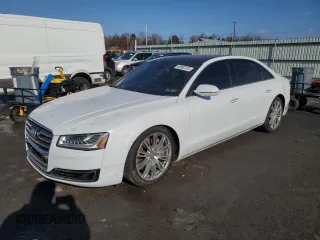 2016 Audi A8 L 3.0T with VIN WAU34AFD7GN008642, listed as a Copart auction lot 88980125 with 78,861 mi miles and Salvage Title. Bid and sale history available at carsss.com. Image 1.