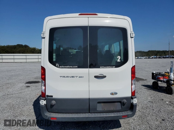 2015 Ford Transit XL z VIN 1FBZX2CM8FKA64060, wystawiony jako Copart lot #74784034 z przebiegiem 33 249 mil mil oraz Szkoda całkowita • Salvage title. Historia ofert i sprzedaży dostępna na DreamBid. Obrazek 6.