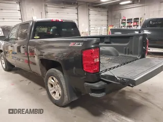 2016 Chevrolet Silverado 1500 LT with VIN 3GCUKRECXGG216804, listed as a IAAI auction lot 41825811 with 127,217 mi miles and . Bid and sale history available at DreamBid. Image 3.