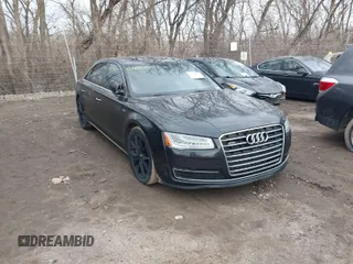 2015 Audi A8 L 4.0T with VIN WAU32AFD5FN026108, listed as a IAAI auction lot 41652860 with 148,253 mi miles. Bid and sale history available at carsss.com. Image 1.