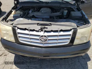 2002 Cadillac Escalade z VIN 1GYEC63T42R189976, wystawiony jako Copart lot #57852565 z przebiegiem 243 089 mil mil oraz Szkody całkowita. Historia ofert i sprzedaży dostępna na DreamBid. Obrazek 12.