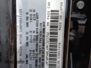 2021 Mazda 3 Select with VIN JM1BPABLXM1323702, listed as a Copart auction lot 58871235 with 84,298 mi miles and Salvage title. Bid and sale history available at DreamBid. Image 12.
