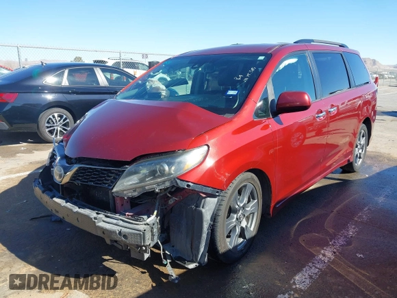 2018 Toyota Sienna SE with VIN 5TDXZ3DC4JS911408, listed as a IAAI auction lot 41393387 with 147,157 mi miles and . Bid and sale history available at DreamBid. Image 2.