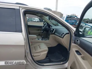 2014 Jeep Grand Cherokee Limited z VIN 1C4RJFBG8EC408754, wystawiony jako IAAI lot #42612211 z przebiegiem 149 017 mil mil oraz . Historia ofert i sprzedaży dostępna na DreamBid. Obrazek 5.