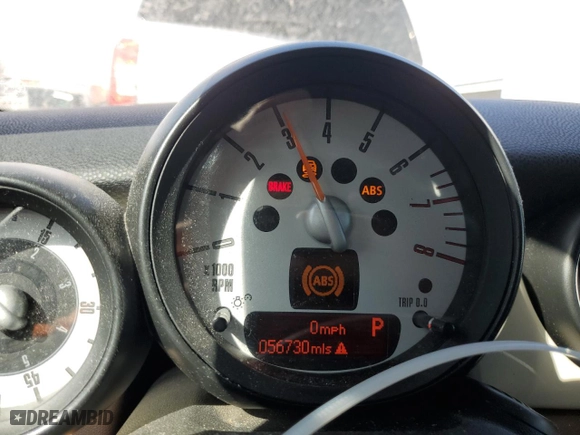 2014 MINI Cooper Convertible with VIN WMWZN3C59ET569823, listed as a Copart auction lot 72543194 with 56,730 mi miles and Salvage Title. Bid and sale history available at carsss.com. Image 9.