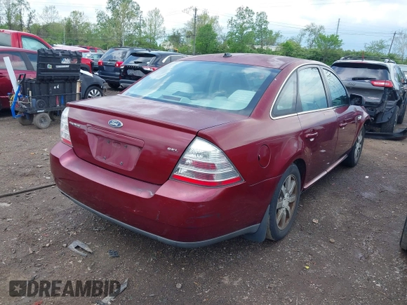 2008 Ford Taurus SEL with VIN 1FAHP24W88G149063, listed as a IAAI auction lot 42168947 with 128,735 mi miles and . Bid and sale history available at DreamBid. Image 4.