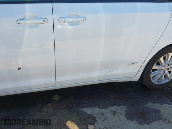 2011 Toyota Sienna XLE with VIN 5TDDK3DCXBS029961, listed as a IAAI auction lot 42228356 with 251,571 mi miles and . Bid and sale history available at DreamBid. Image 6.