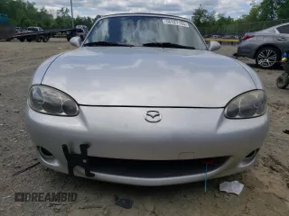 2004 Mazda MX-5 Miata LS with VIN JM1NB353640400140, listed as a Copart auction lot 56127165 with 123,276 mi miles and Salvage title. Bid and sale history available at DreamBid. Image 5.