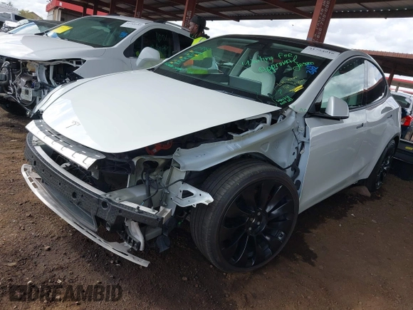 2022 Tesla Model Y Performance with VIN 7SAYGDEF4NF449986, listed as a IAAI auction lot 41754916 with 64,384 mi miles and . Bid and sale history available at DreamBid. Image 20.
