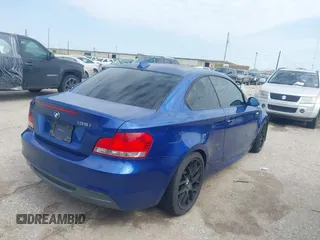 2008 BMW 1 Series 135i with VIN WBAUC73598VF23878, listed as a IAAI auction lot 41569879 with 186,622 mi miles. Bid and sale history available at carsss.com. Image 4.