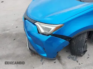 2016 Toyota RAV4 SE with VIN JTMJFREV3GJ076876, listed as a IAAI auction lot 41566899 with 133,216 mi miles and . Bid and sale history available at DreamBid. Image 6.