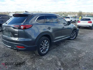 2019 Mazda CX-9 Signature with VIN JM3TCBEYXK0324257, listed as a IAAI auction lot 41986590 with Not provided miles and . Bid and sale history available at DreamBid. Image 4.