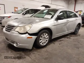 2008 Chrysler Sebring LX with VIN 1C3LC46K58N285060, listed as a IAAI auction lot 42002102 with 156,460 mi miles and . Bid and sale history available at DreamBid. Image 21.
