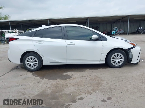 2022 Toyota Prius L Eco with VIN JTDKAMFUXN3157225, listed as a IAAI auction lot 39292379 with 59,333 mi miles and . Bid and sale history available at DreamBid. Image 14.