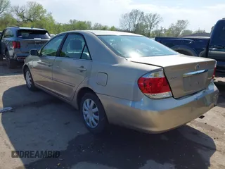2006 Toyota Camry STD with VIN 4T1BE32K16U680241, listed as a IAAI auction lot 42002721 with 188,867 mi miles. Bid and sale history available at carsss.com. Image 3.