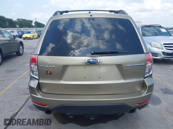 2009 Subaru Forester X Limited z VIN JF2SH64699H745428, wystawiony jako IAAI lot #42407890 z przebiegiem 131 716 mil mil oraz . Historia ofert i sprzedaży dostępna na DreamBid. Obrazek 16.