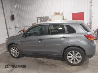 2015 Mitsubishi Outlander Sport ES with VIN 4A4AR3AU0FE014305, listed as a IAAI auction lot 41808030 with 90,753 mi miles. Bid and sale history available at carsss.com. Image 14.