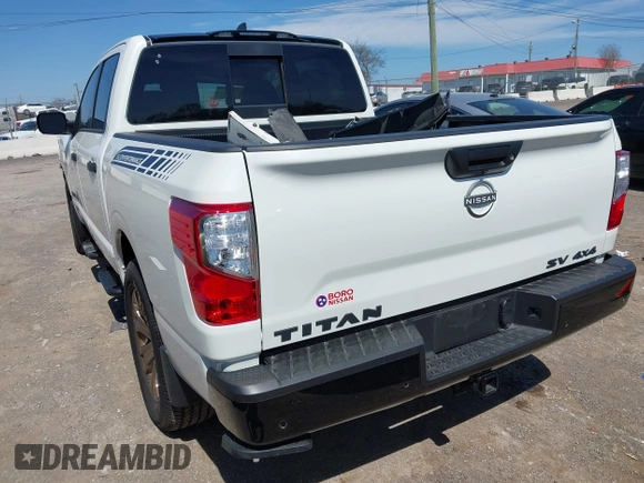 2024 Nissan Titan Pro-4X with VIN 1N6AA1EDXRN113731, listed as a IAAI auction lot 41821782 with 986 mi miles and . Bid and sale history available at DreamBid. Image 3.
