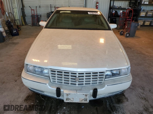 1993 Cadillac Seville Touring STS z VIN 1G6KY5295PU817593, wystawiony jako Copart lot #47807075 z przebiegiem Nie podano mil oraz Czysty tytuł • Clean title. Historia ofert i sprzedaży dostępna na DreamBid. Obrazek 5.