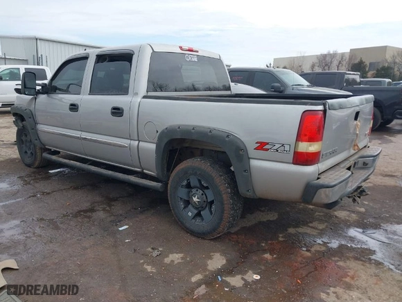 2006 GMC Sierra 1500 SLT with VIN 2GTEK13T461140044, listed as a IAAI auction lot 41590434 with 242,317 mi miles. Bid and sale history available at carsss.com. Image 3.