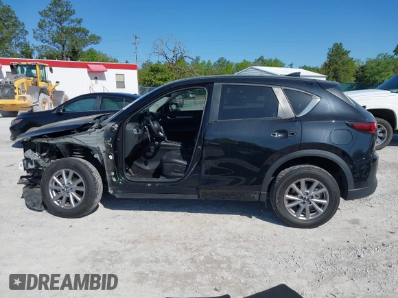 2023 Mazda CX-5 S Preferred with VIN JM3KFBCM7P0188244, listed as a IAAI auction lot 41969630 with 51,058 mi miles and . Bid and sale history available at carsss.com. Image 15.
