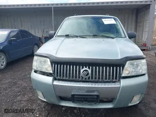 2005 Mercury Mariner Luxury with VIN 4M2CU57145DJ22822, listed as a IAAI auction lot 41932692 with 167,263 mi miles. Bid and sale history available at carsss.com. Image 6.