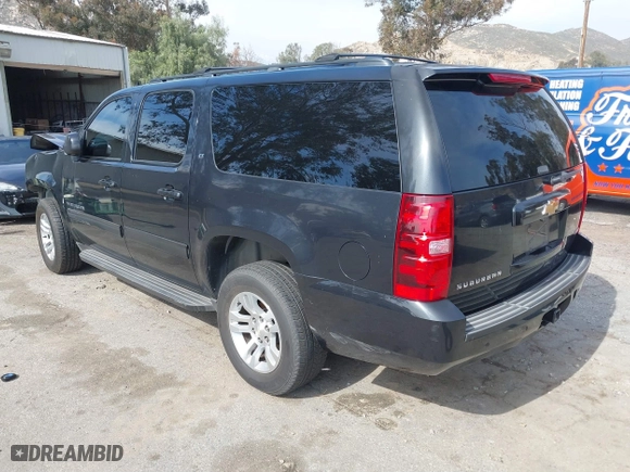 2012 Chevrolet Suburban LT with VIN 1GNSCJE0XCR257186, listed as a IAAI auction lot 41597580 with 174,284 mi miles. Bid and sale history available at carsss.com. Image 3.