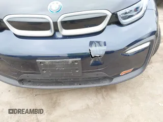 2019 BMW i3 z VIN WBY8P4C54K7E83372, wystawiony jako IAAI lot #42055886 z przebiegiem 22 230 mil mil oraz . Historia ofert i sprzedaży dostępna na DreamBid. Obrazek 19.