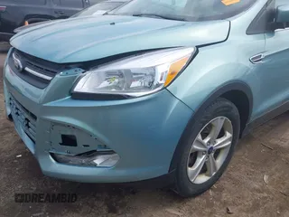 2013 Ford Escape SE with VIN 1FMCU0G96DUD23081, listed as a IAAI auction lot 42147883 with 117,275 mi miles and . Bid and sale history available at DreamBid. Image 6.