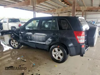 2011 Suzuki Grand Vitara Premium with VIN JS3TD0D28B4102365, listed as a Copart auction lot 60560495 with 176,190 mi miles and Salvage title. Bid and sale history available at DreamBid. Image 2.