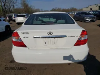 2004 Toyota Camry LE with VIN 4T1BE32K04U291801, listed as a Copart auction lot 54370015 with 164,414 mi miles and Salvage Title. Bid and sale history available at carsss.com. Image 6.