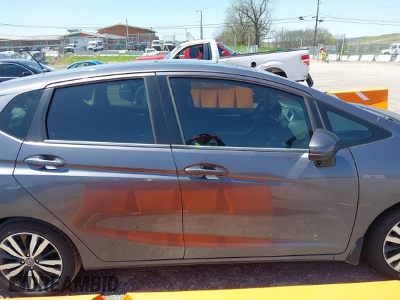 2015 Honda Fit EX-L with VIN 3HGGK5H88FM729435, listed as a IAAI auction lot 41998376 with 130,723 mi miles. Bid and sale history available at carsss.com. Image 13.
