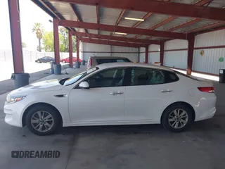 2016 Kia Optima LX with VIN KNAGT4L34G5105864, listed as a IAAI auction lot 42161194 with 106,351 mi miles. Bid and sale history available at carsss.com. Image 14.