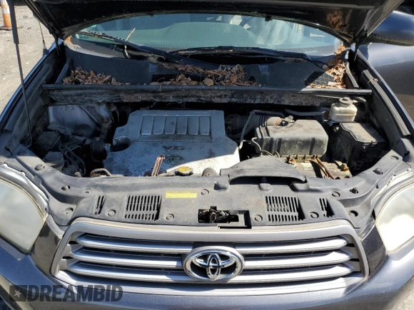 2010 Toyota Highlander with VIN 5TDBK3EH9AS002654, listed as a Copart auction lot 57079375 with 245,701 mi miles and Clean title. Bid and sale history available at DreamBid. Image 12.